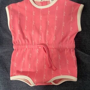 Kith Pink Baby Romper with White Accents